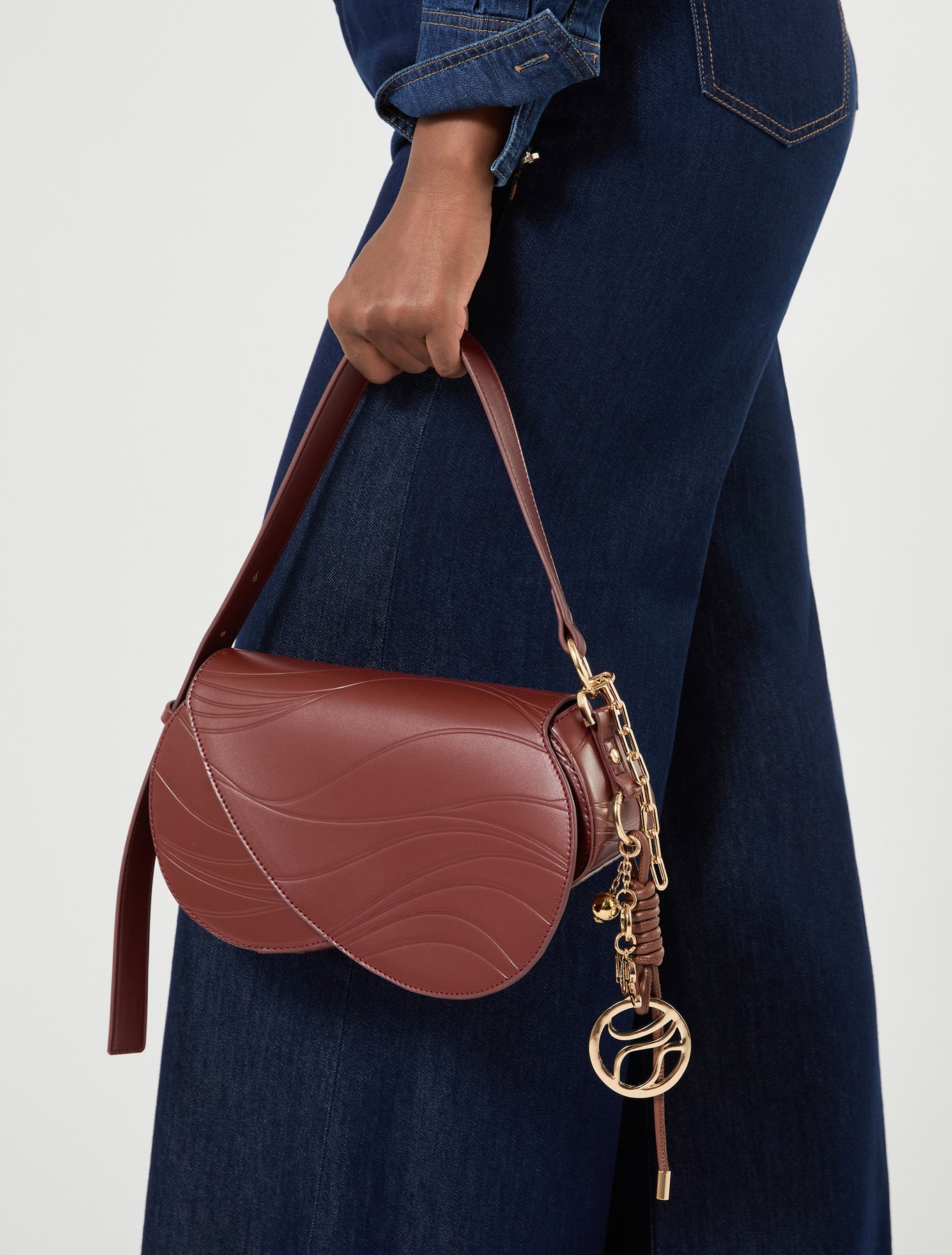 Marina Rinaldi charm-adorned wavy flapover bag for woman
