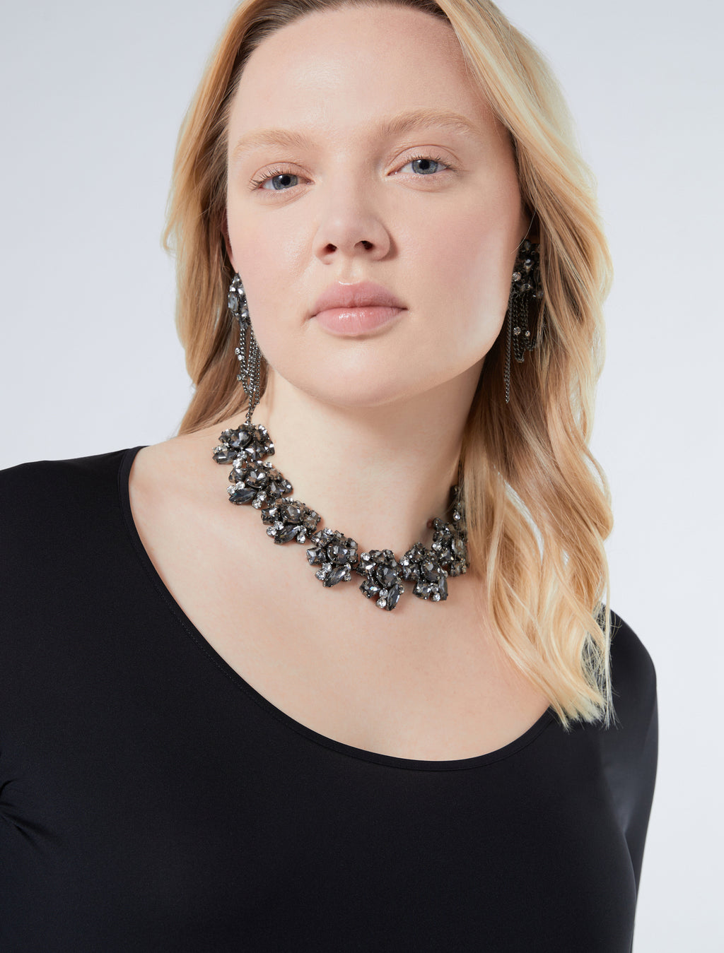 Rhinestone-adorned choker and earrings