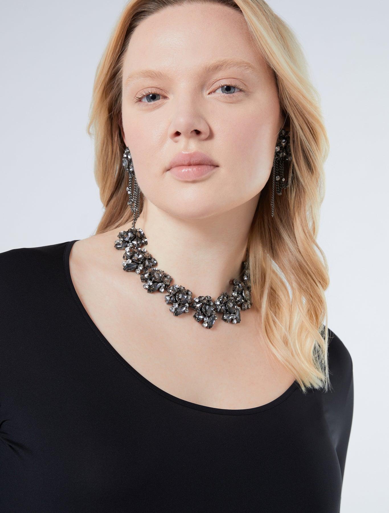 Rhinestone-adorned choker and earrings