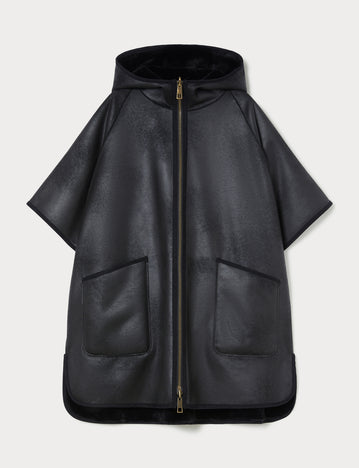 Reversible cape with a soft texture