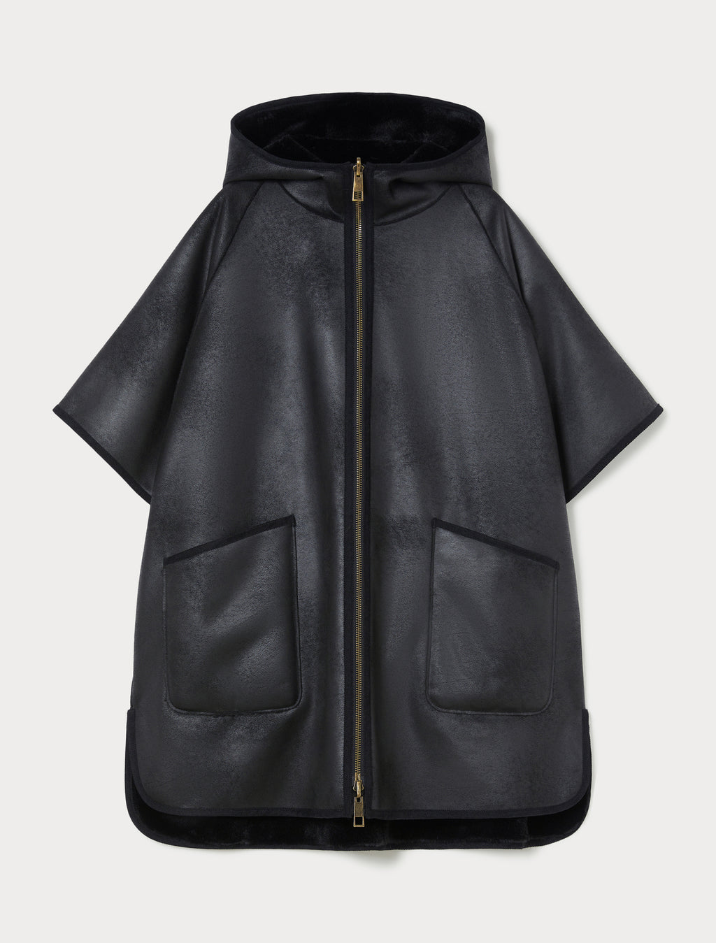 Reversible cape with a soft texture