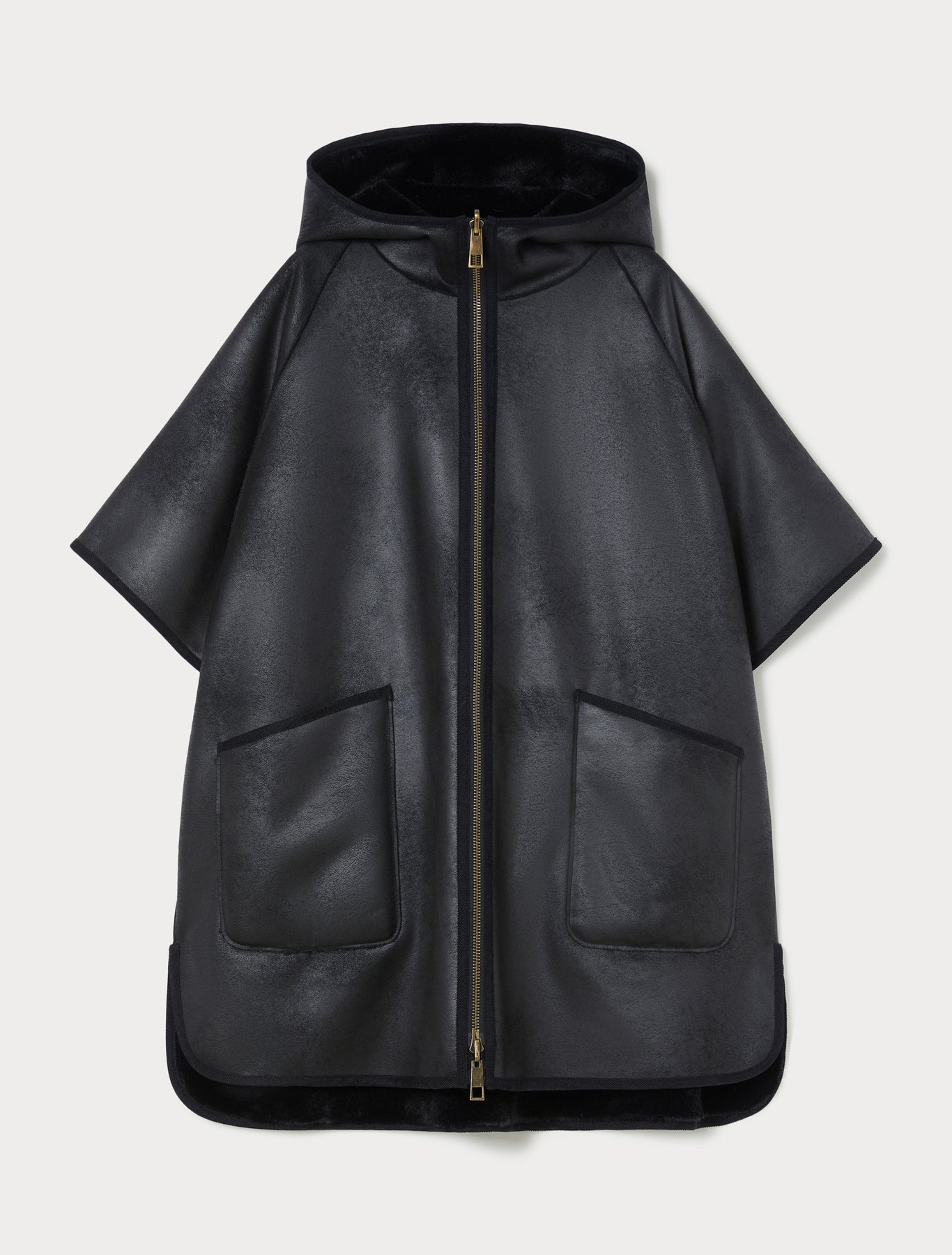 Reversible cape with a soft texture